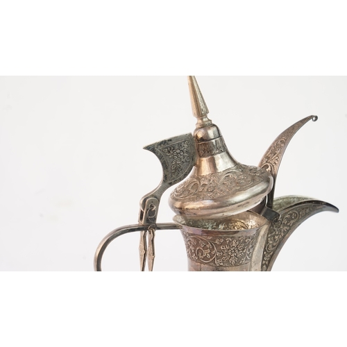 52 - A SILVER DALLAH COFFEE POT, MUSCAT, EARLY 20TH CENTURY. Of traditional shape, a silver coffee pot wi... 