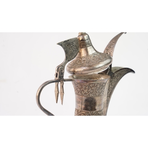 52 - A SILVER DALLAH COFFEE POT, MUSCAT, EARLY 20TH CENTURY. Of traditional shape, a silver coffee pot wi... 