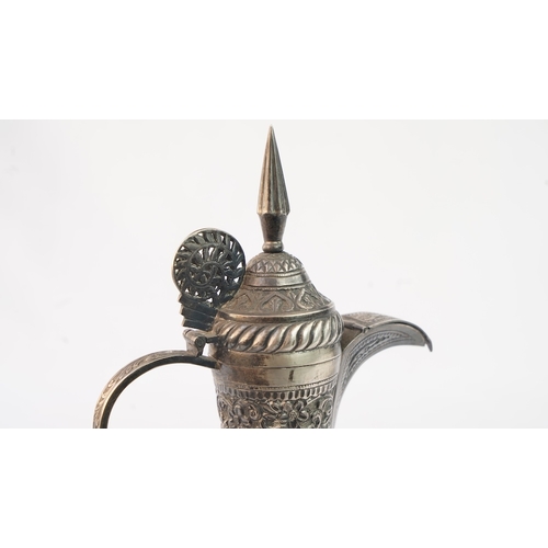 53 - A LATE 19TH CENTURY MIDDLE EASTERN PERSIAN SILVER TEAPOT.  Of traditional shape, a silver coffee pot... 