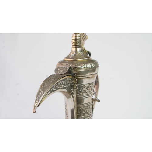 54 - A SILVER COFFEE POT (DALLAH), OMAN NIZWA, 1940-50  Of traditional shape, a silver coffee pot with fi... 