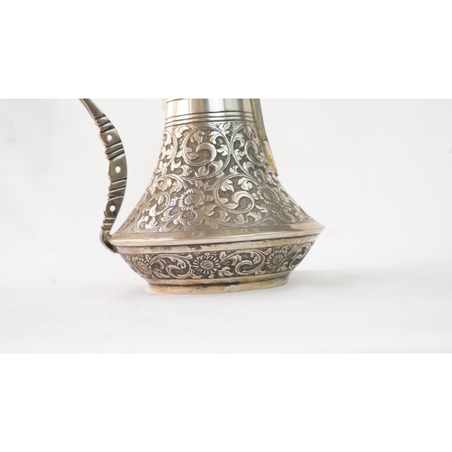 54 - A SILVER COFFEE POT (DALLAH), OMAN NIZWA, 1940-50  Of traditional shape, a silver coffee pot with fi... 