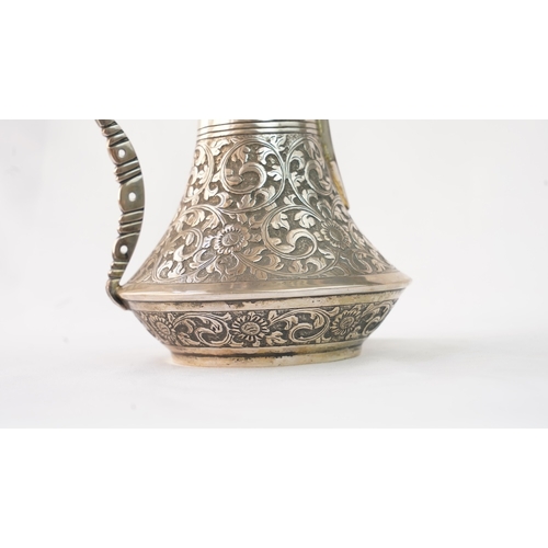 54 - A SILVER COFFEE POT (DALLAH), OMAN NIZWA, 1940-50  Of traditional shape, a silver coffee pot with fi... 