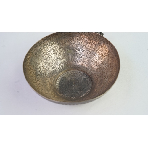 6 - A FINELY ENGRAVED SILVER CUP The interior profoundly engraved with a band of Arabic inscriptions, en... 