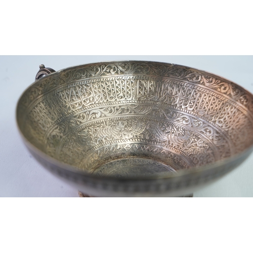 6 - A FINELY ENGRAVED SILVER CUP The interior profoundly engraved with a band of Arabic inscriptions, en... 