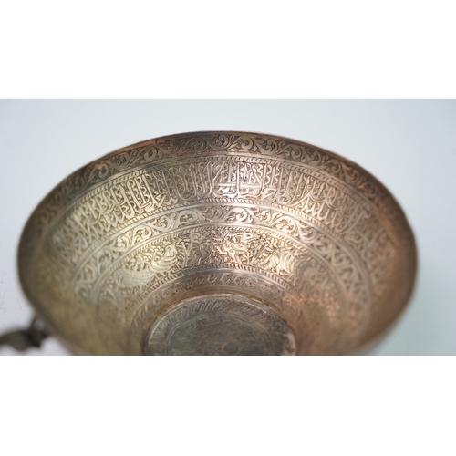 6 - A FINELY ENGRAVED SILVER CUP The interior profoundly engraved with a band of Arabic inscriptions, en... 