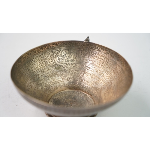 6 - A FINELY ENGRAVED SILVER CUP The interior profoundly engraved with a band of Arabic inscriptions, en... 