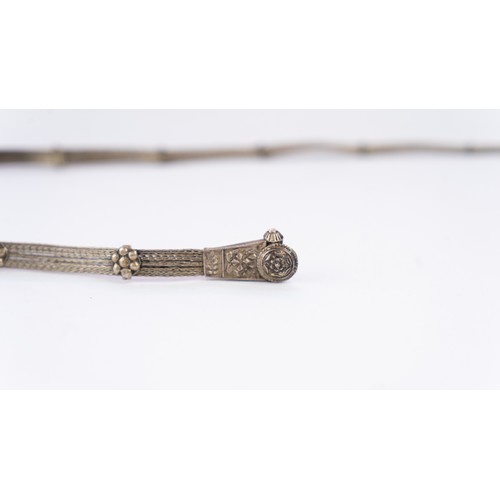 138 - A WOVEN SILVER INDIAN BELT,
Composed of multiple interwoven strands, each delicately joined with sil... 