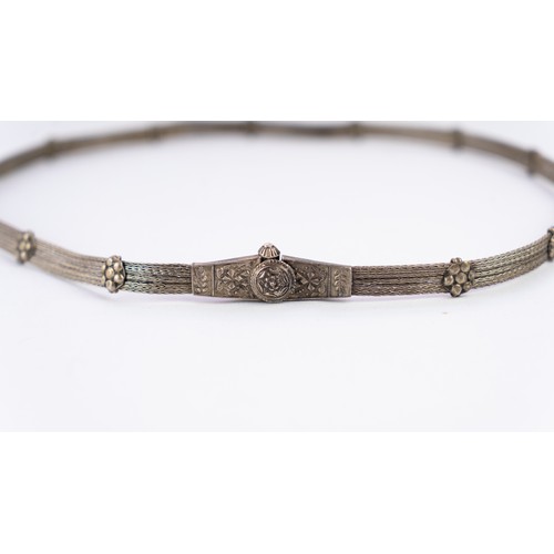 138 - A WOVEN SILVER INDIAN BELT,
Composed of multiple interwoven strands, each delicately joined with sil... 