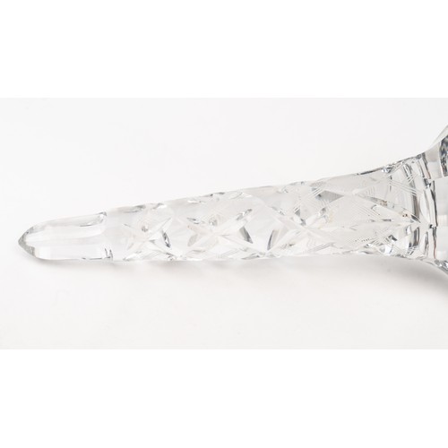 140 - AN ELEGANT CRYSTAL DECANTER AND ITS STOPPER,The decanter of rounded form, the faceted face accented ... 