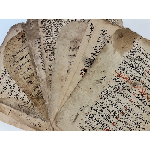 148 - A COLLECTION OF 15 MANUSCRIPT FOLIOS
Arabic manuscript on paper,