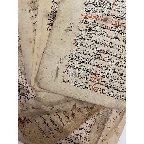 148 - A COLLECTION OF 15 MANUSCRIPT FOLIOS
Arabic manuscript on paper,