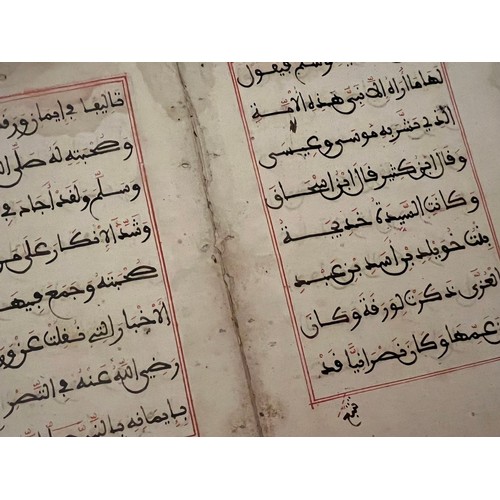 142 - A MAGHRIB BIFOLIO FROM A HADITH BOOK, NORTH AFRICA
Arabic manuscript on watermarked paper, 8ll. Of d... 