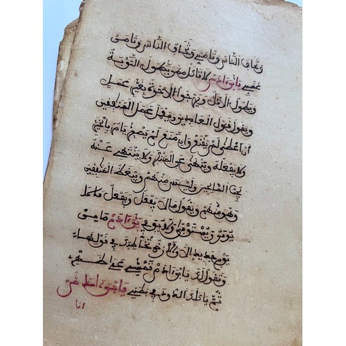 134 - TWO FOLIOS FROM A MAGHRIB QUR’ANIC MANUSCRIPT
Arabic manuscript on paper, 12 lines of dark sepia mag... 