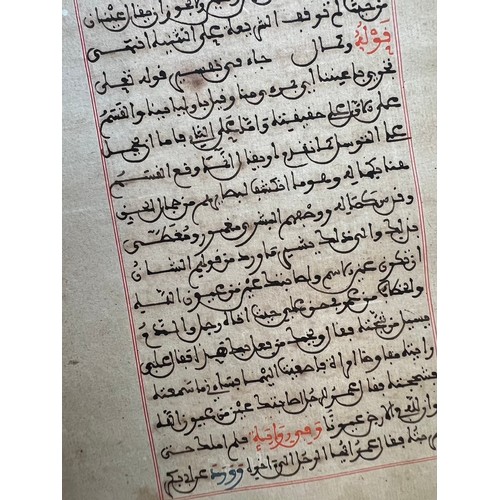 135 - AN ISLAMIC FOLIO FROM A RELIGIOUS MANUSCRIPT
Arabic manuscript on paper, 17 lines of dark sepia Magh... 