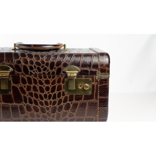 4 - A FINE ALLIGATOR OR CROCODILE LEATHER TRAVEL CASE, EARLY 20TH CENTURY.Of rectangular form, a meticul... 