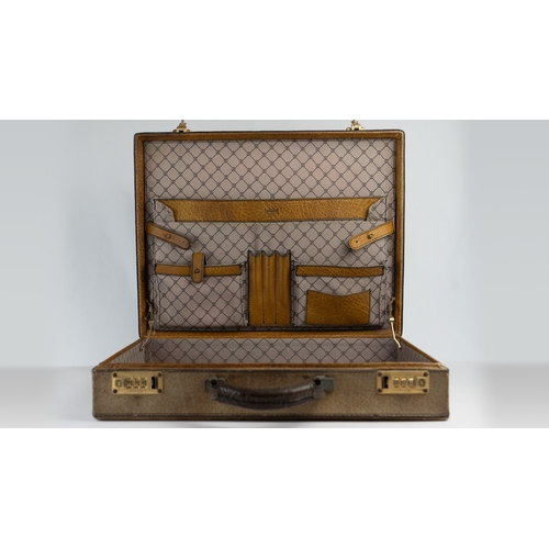 9 - A CARACCIOLA GOLD-PFEIL BRIEFCASE, WEST GERMANY. Of rectangular form, featuring many compartments, p... 