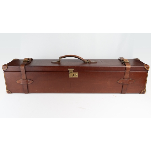 10 - A LEATHER DOUBLE MOTOR GUNCASE.Of rectangular form, fitted for 28in. barrels (could be adapted to 31... 