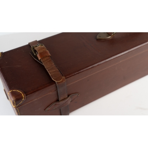 10 - A LEATHER DOUBLE MOTOR GUNCASE.Of rectangular form, fitted for 28in. barrels (could be adapted to 31... 