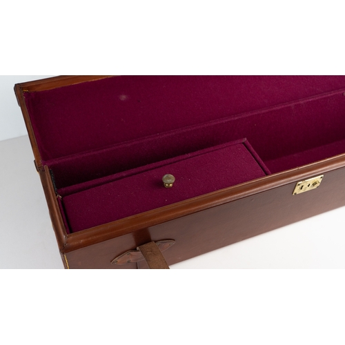 10 - A LEATHER DOUBLE MOTOR GUNCASE.Of rectangular form, fitted for 28in. barrels (could be adapted to 31... 