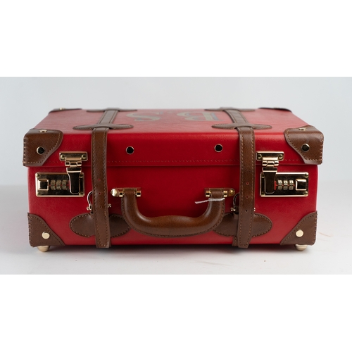 12 - THE ENTREPRENEUR, OVERNIGHTER, by STEAMLINE LUGGAGE.Of rectangular form, featuring red vegan leather... 