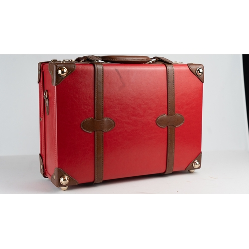 12 - THE ENTREPRENEUR, OVERNIGHTER, by STEAMLINE LUGGAGE.Of rectangular form, featuring red vegan leather... 