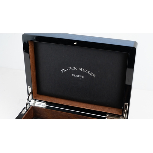 19 - A FRANCK MULLER, GENEVE WATCH BOX.  Of square form, crafted in blue lacquer box, featuring a wooden ... 