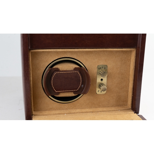 20 - A DULWICH DESIGN LEATHER WATCH WINDER BOX.Of contemporary design, crafted in dark brown bonded leath... 