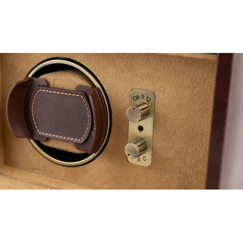 20 - A DULWICH DESIGN LEATHER WATCH WINDER BOX.Of contemporary design, crafted in dark brown bonded leath... 