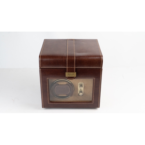 20 - A DULWICH DESIGN LEATHER WATCH WINDER BOX.Of contemporary design, crafted in dark brown bonded leath... 