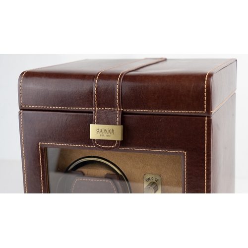 20 - A DULWICH DESIGN LEATHER WATCH WINDER BOX.Of contemporary design, crafted in dark brown bonded leath... 