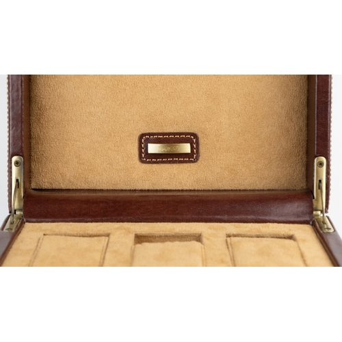 20 - A DULWICH DESIGN LEATHER WATCH WINDER BOX.Of contemporary design, crafted in dark brown bonded leath... 