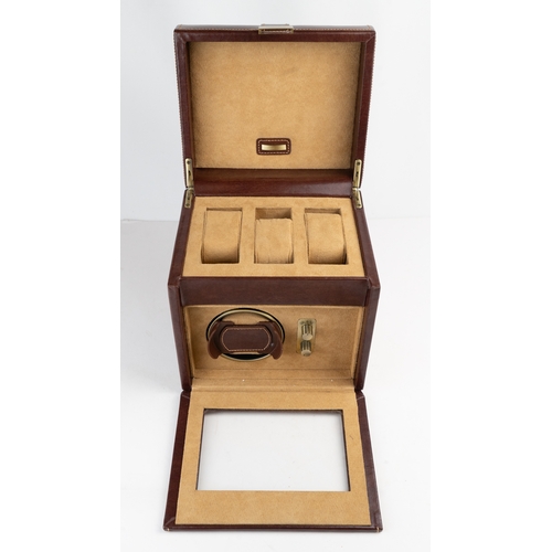 20 - A DULWICH DESIGN LEATHER WATCH WINDER BOX.Of contemporary design, crafted in dark brown bonded leath... 