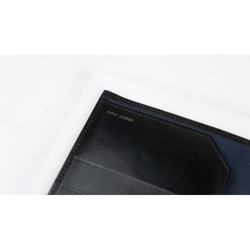 28 - A BLACK LEATHER ASPREY WRITING MEMO PAD, ASPREY LONDON, EARLY 21ST CENTURY
A black leather cover, op... 