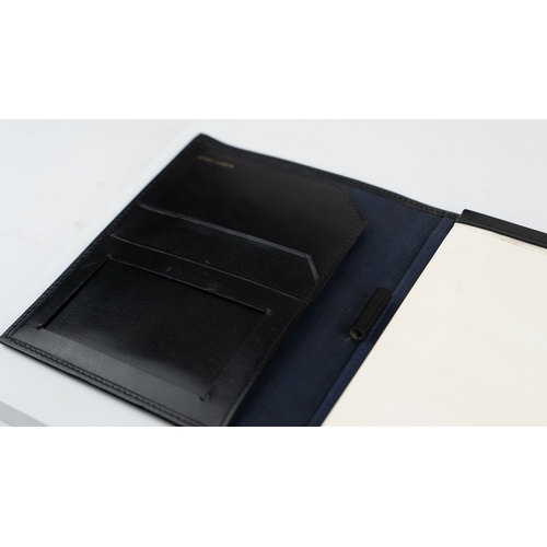 28 - A BLACK LEATHER ASPREY WRITING MEMO PAD, ASPREY LONDON, EARLY 21ST CENTURY
A black leather cover, op... 