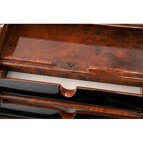 34 - VISCONTI LACQUER PEN HOLDER
Featuring a slatted roll-down opening, this lacquer pen case elegantly u... 