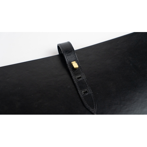 43 - A BLACK LEATHER DOCUMENT HOLDER,
Of rectangular form, the front pocket, the interior housing four se... 