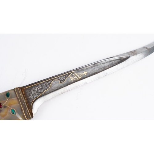 75 - A PUNJABI DAGGER ‘CHOORA’, INDIA 

With single-edged watered-steel, a pointy and curved dagger with ... 