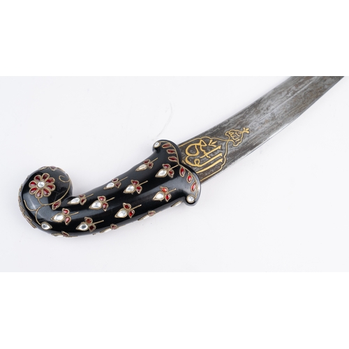 80 - MASSIVE KHANJAR

black nephrite stock-shaped pommel adorned with a semi-floret composed of red ename... 