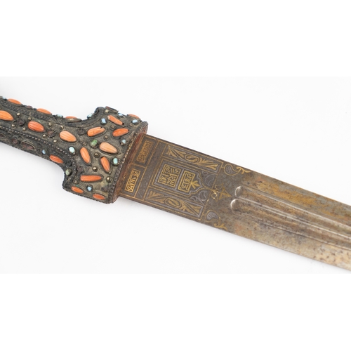 82 - AN OTTOMAN TURQUOISE & CORAL-INLAID GOLD DAMASCENED STEEL DAGGER (JAMBIYYA) TURKEY, 19TH CENTURY
Dou... 