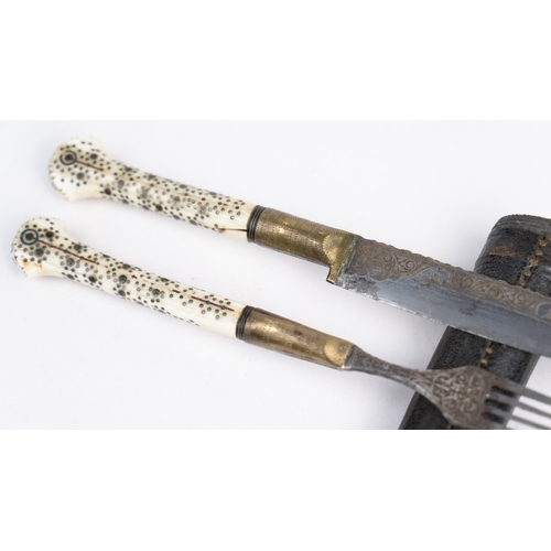 89 - A CUTLERY SET WITH SCABBARD, SARAJEVO, OTTOMAN, 1879
A knife and fork with brass mounts, the forte d... 