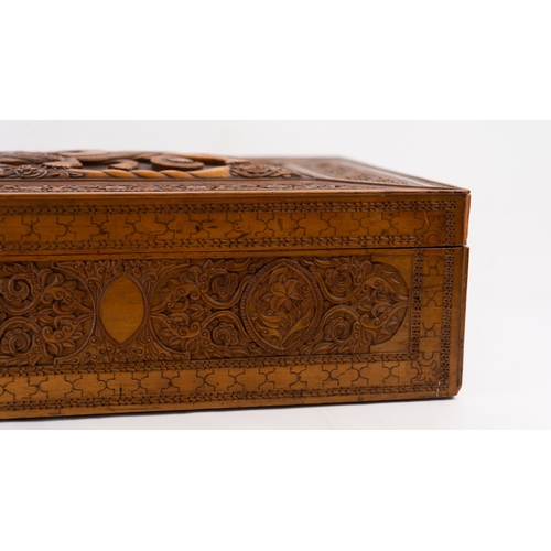 102 - A PERSIAN QAJAR FRUITWOOD BOX, EARLY 20TH CENTURY 

Of rectangular form, with a pull-off lid, the in... 