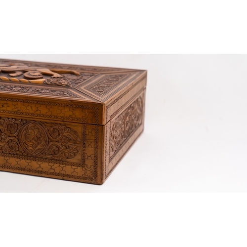 102 - A PERSIAN QAJAR FRUITWOOD BOX, EARLY 20TH CENTURY 

Of rectangular form, with a pull-off lid, the in... 