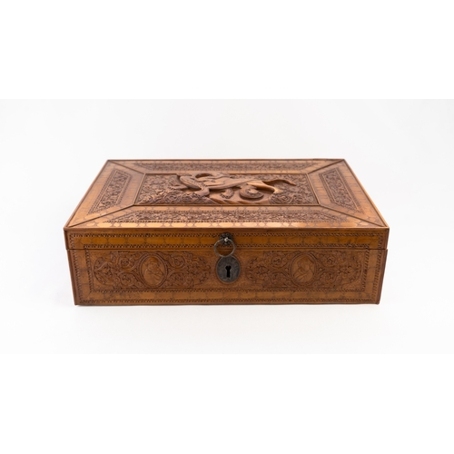 103 - A PERSIAN QAJAR CARVED FRUITWOOD BOX, LATE 19TH CENTURY 
Of rectangular form, resting on flat base, ... 