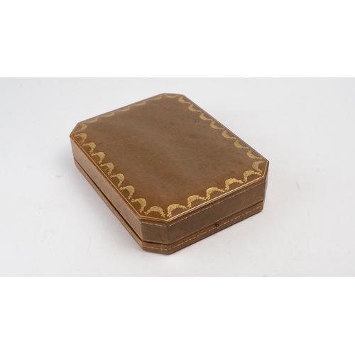 108 - VINTAGE CARTIER JEWELLERY BOX

OF rectangular form, crafted in brown leather, featuring an elegant g... 