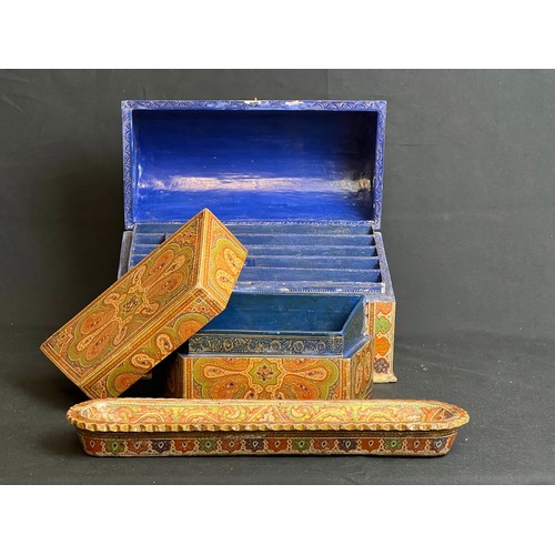 36 - KASHMIRI HANDPAINTED WOODEN DESK SET COMPRISING A DOMED STATIONERY BOX, 
A SMALLER BOX AND PEN TRAY
... 