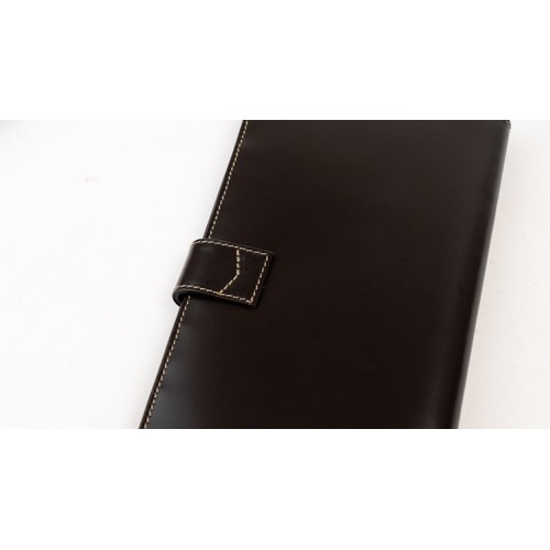 15 - BRAND-NEW DARK BROWN A PATEK PHILIPPE PASSPORT HOLDER, CENEVE
Of rectangular form, crafted in dark b... 