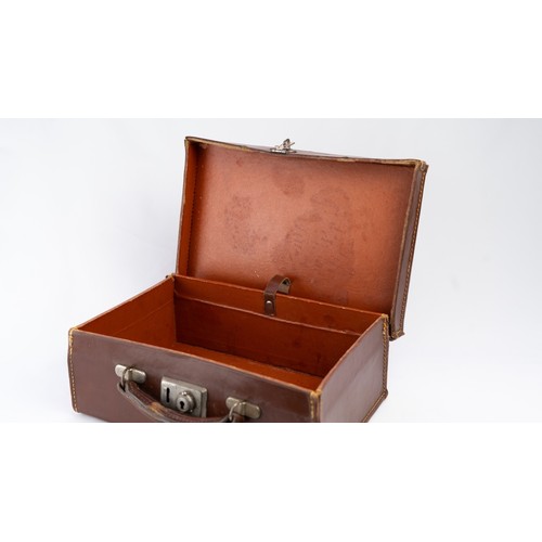 106 - A DARK BROWN LEATHER BRIEFCASE, EARLY 20th CENTURY 
Of rectangular form, a small briefcase featuring... 