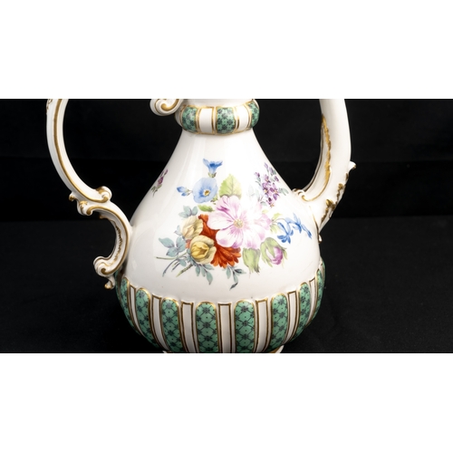 9 - A MEISSEN PORCELAIN EWER, 

Of typical pyriform shape, resting on a gently splayed foot, with a bulb... 