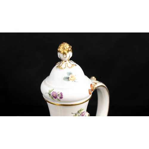 9 - A MEISSEN PORCELAIN EWER, 

Of typical pyriform shape, resting on a gently splayed foot, with a bulb... 