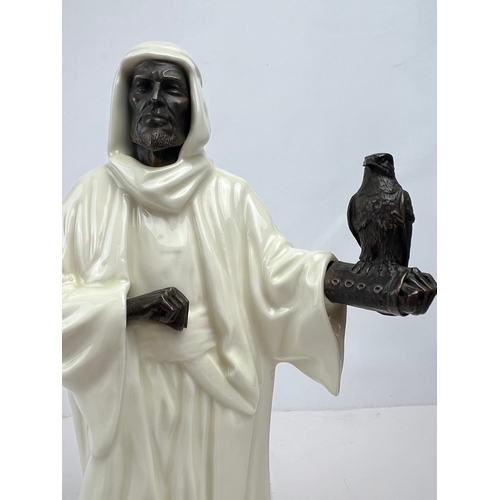 18 - A MINTON FIGURINE “THE SHEIKH”, DATED 1978

An Arab figurine with face, hands and falcon in bronze

... 